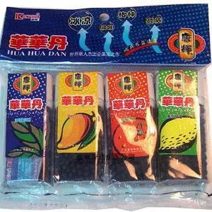 几条用白糖,陈皮,话梅做的糖果"华华丹".